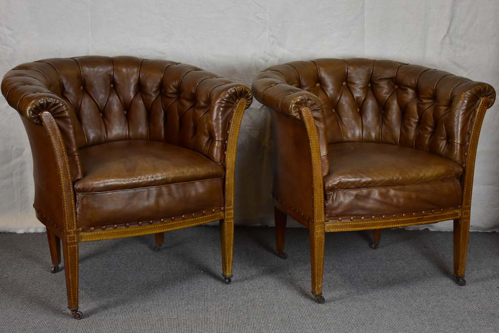 Pair of mid-century English leather armchairs