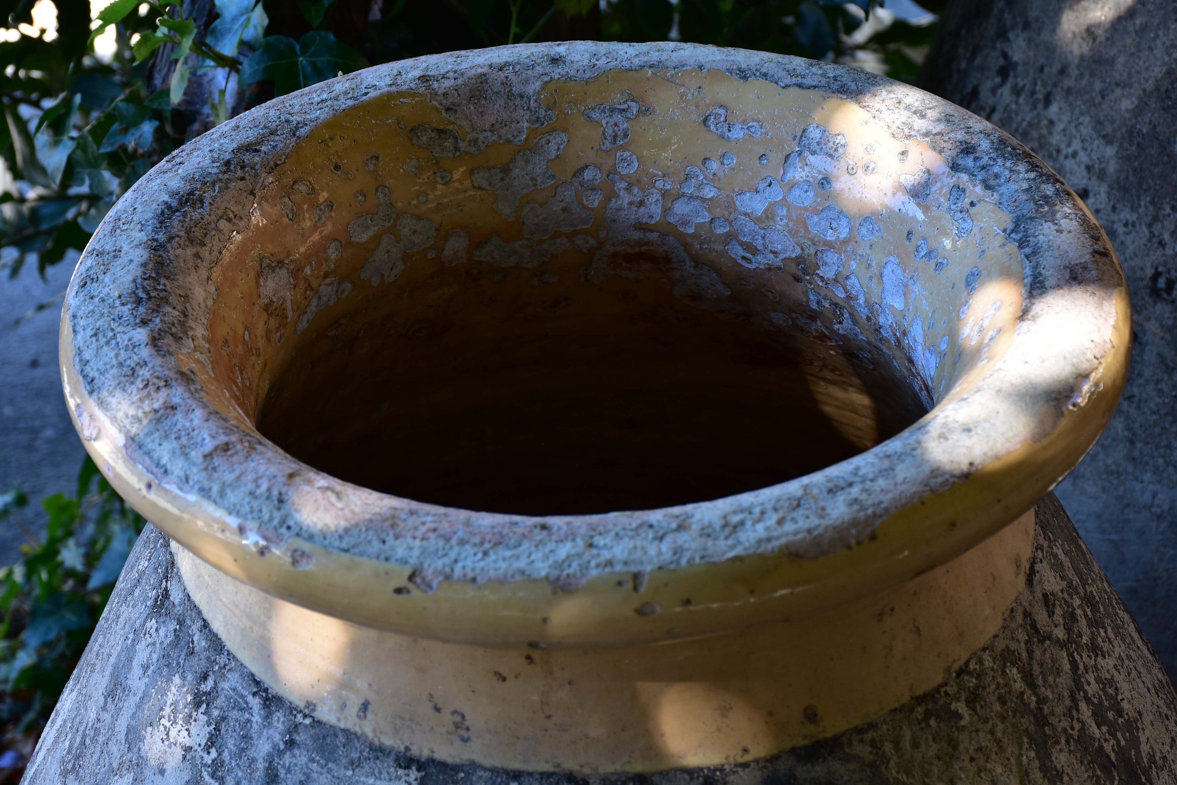 Large 19th century French biot jar with creamy / apricot colour glaze