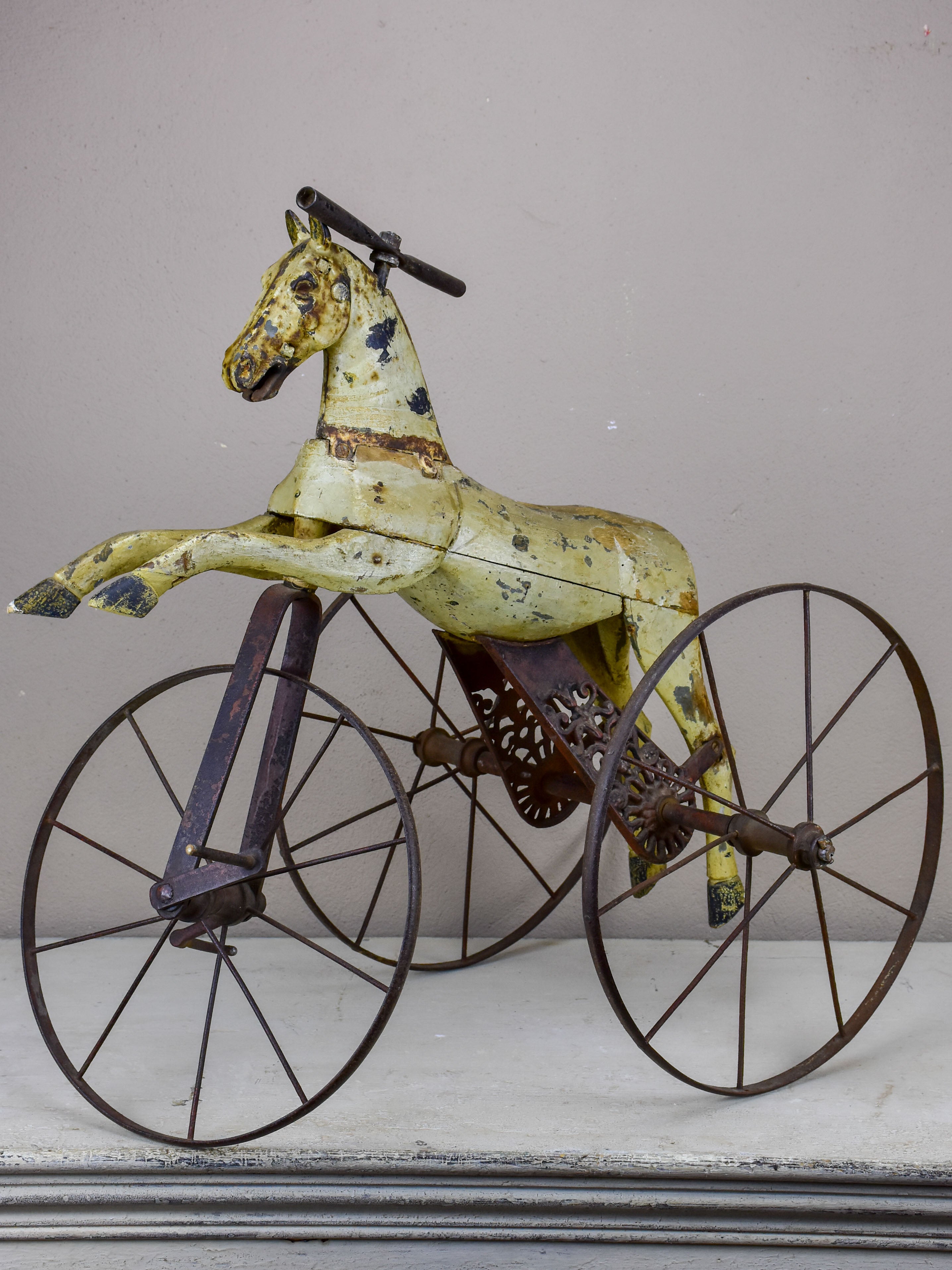 Antique French toy horse tricycle
