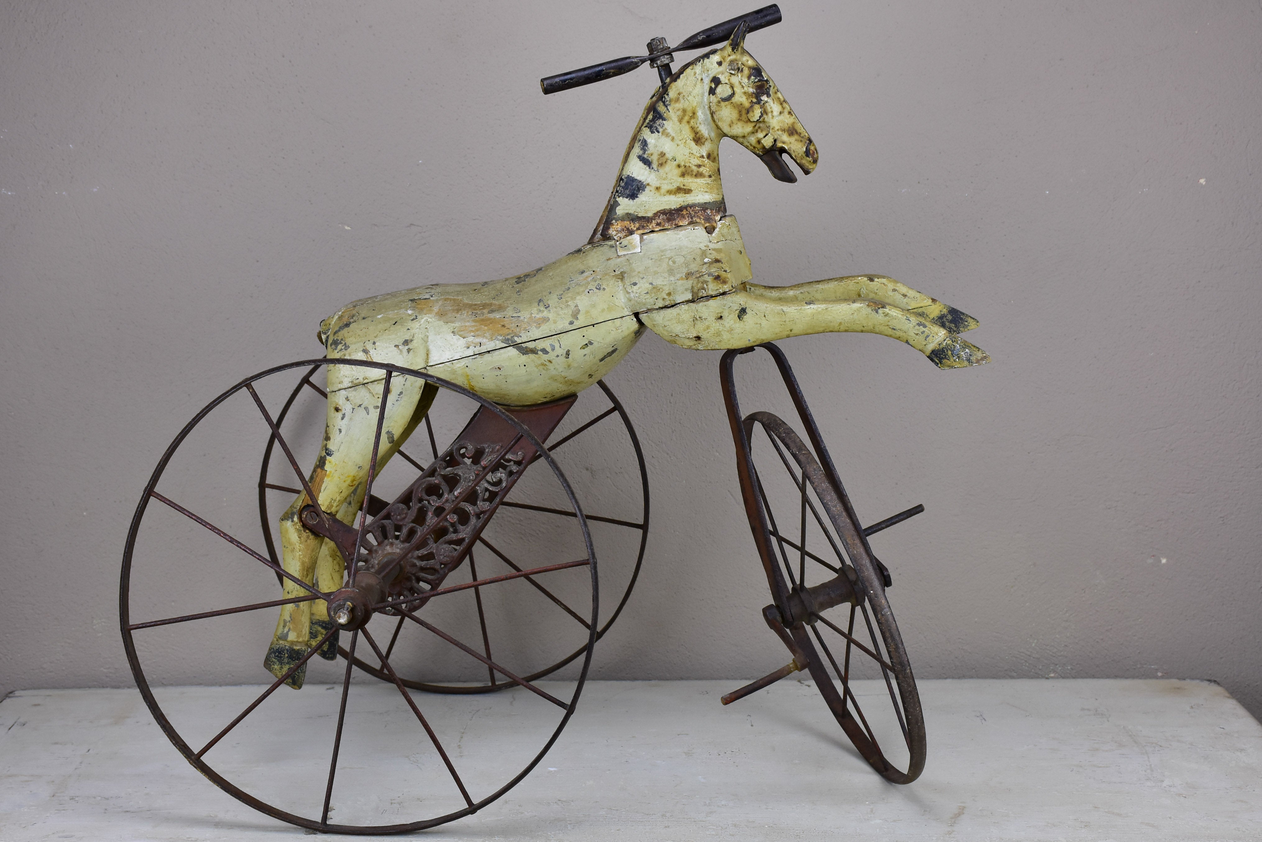 Antique French toy horse tricycle