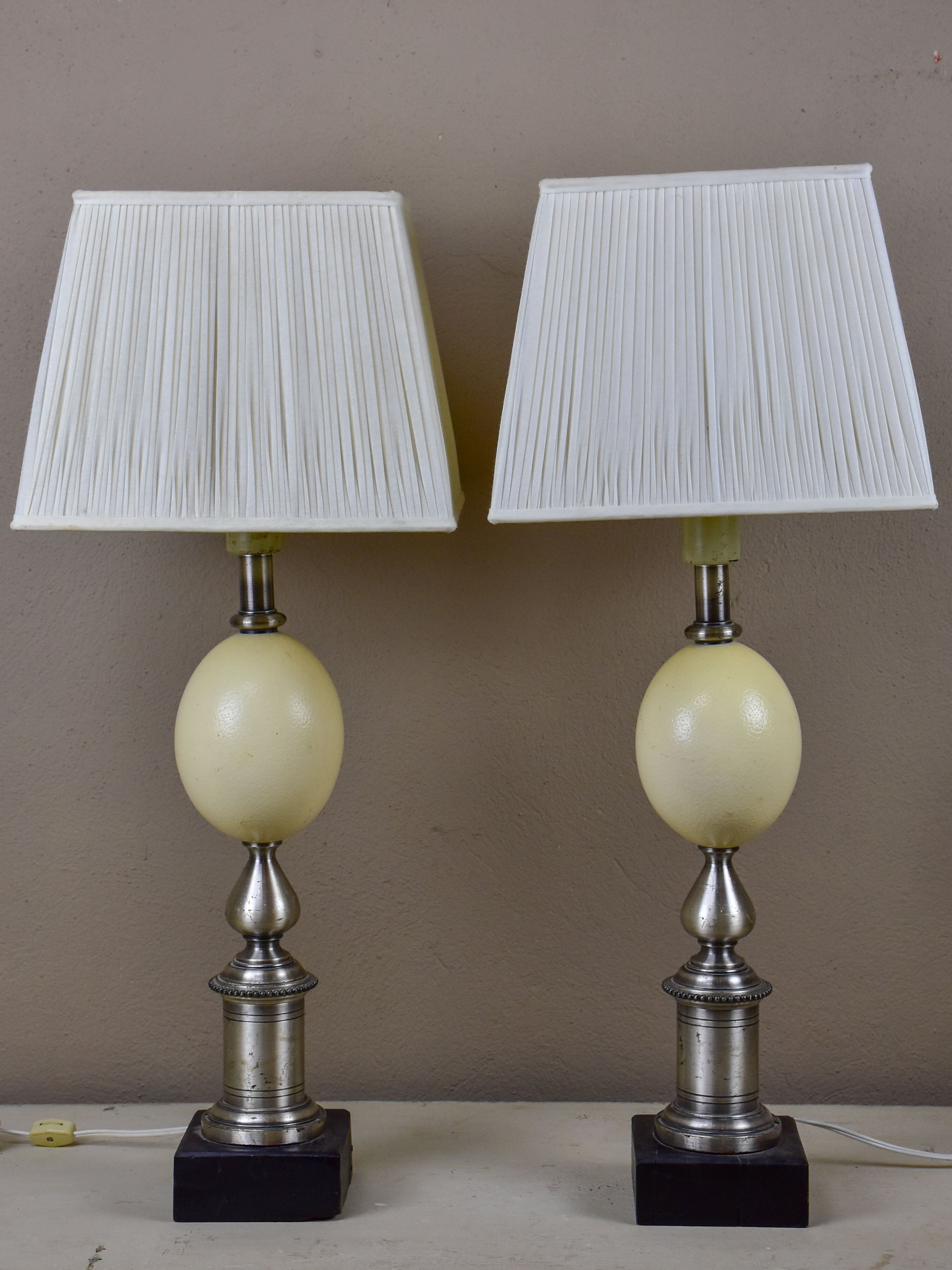 Pair of ostrich egg lamps with square lampshades