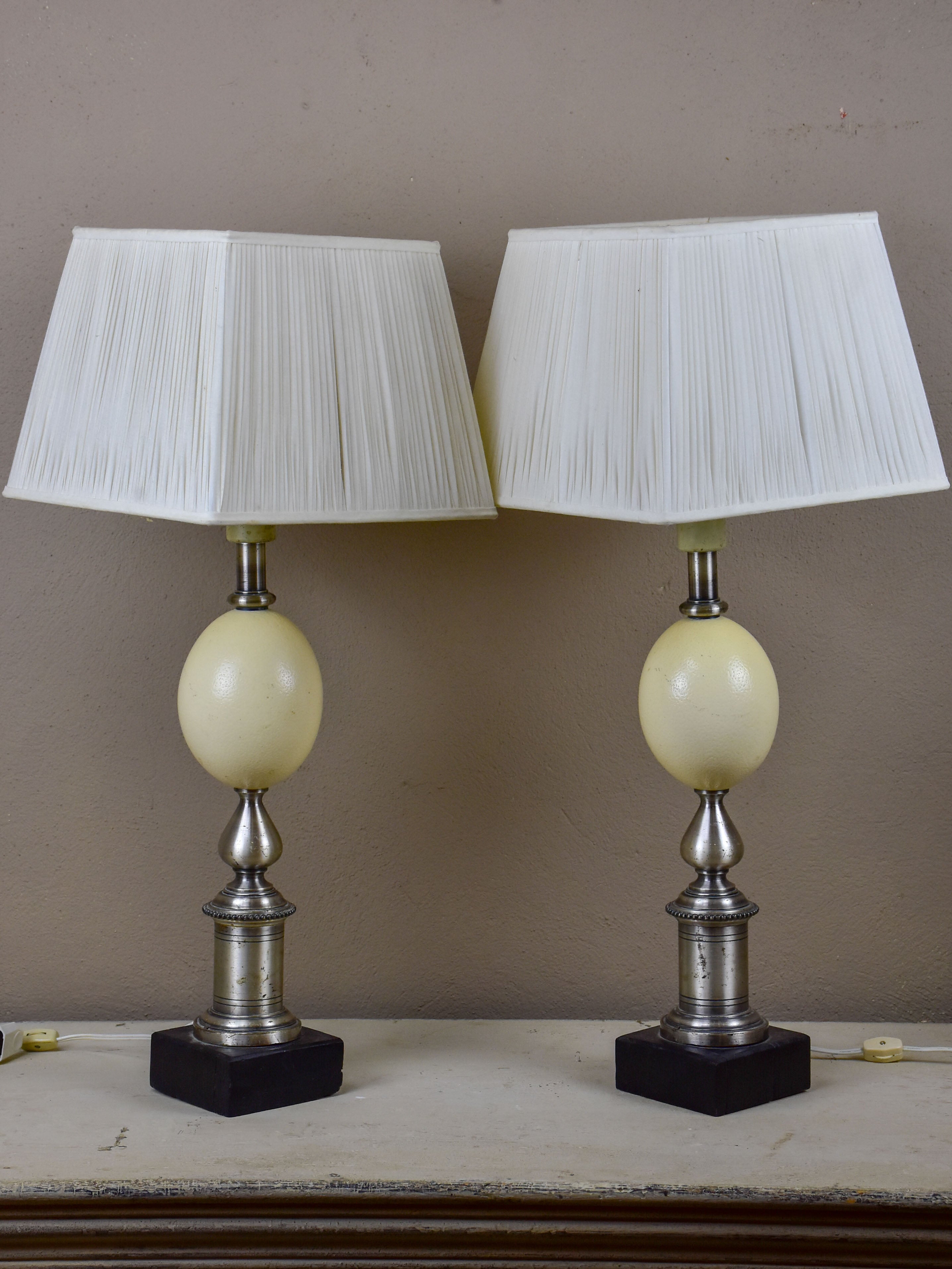 Pair of ostrich egg lamps with square lampshades