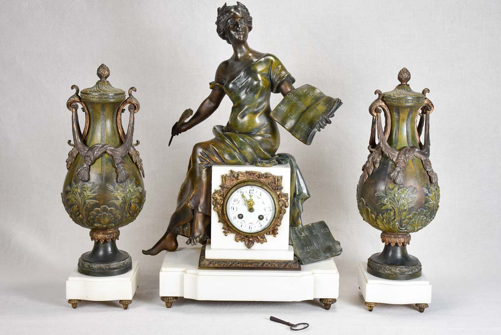 Napoleon III mantle clock with matching ornamental urns