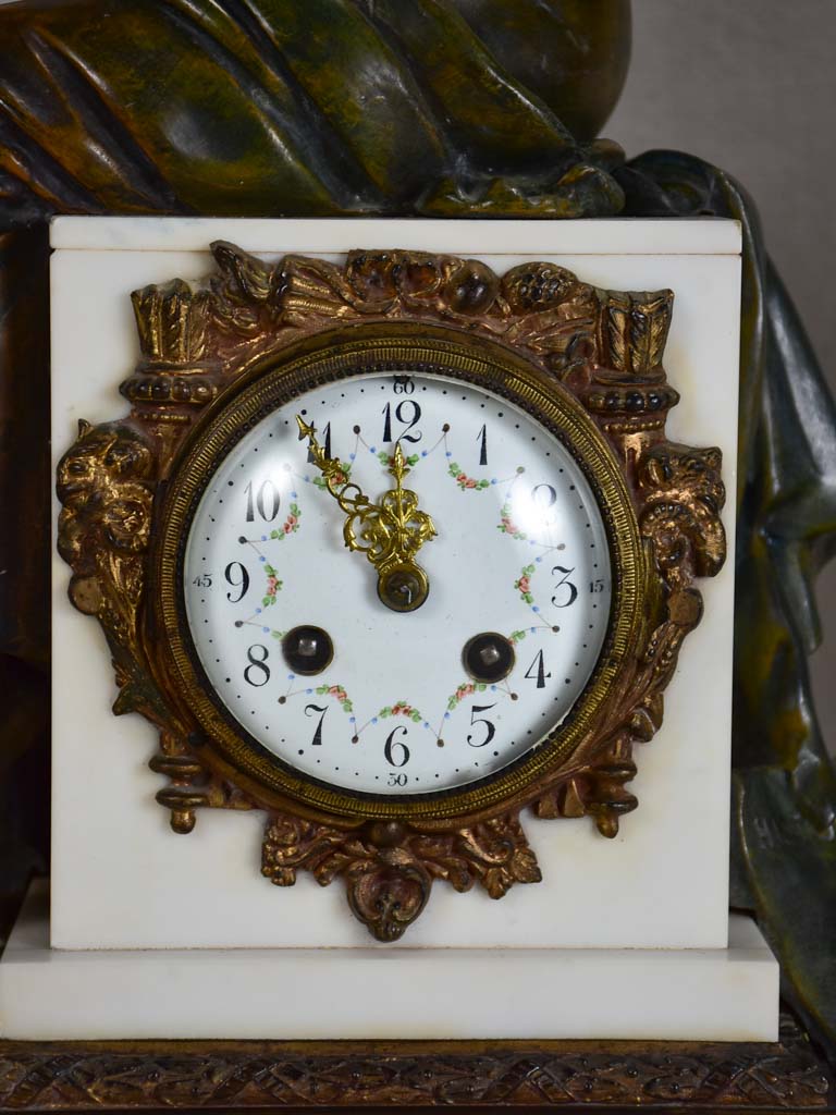 Napoleon III mantle clock with matching ornamental urns