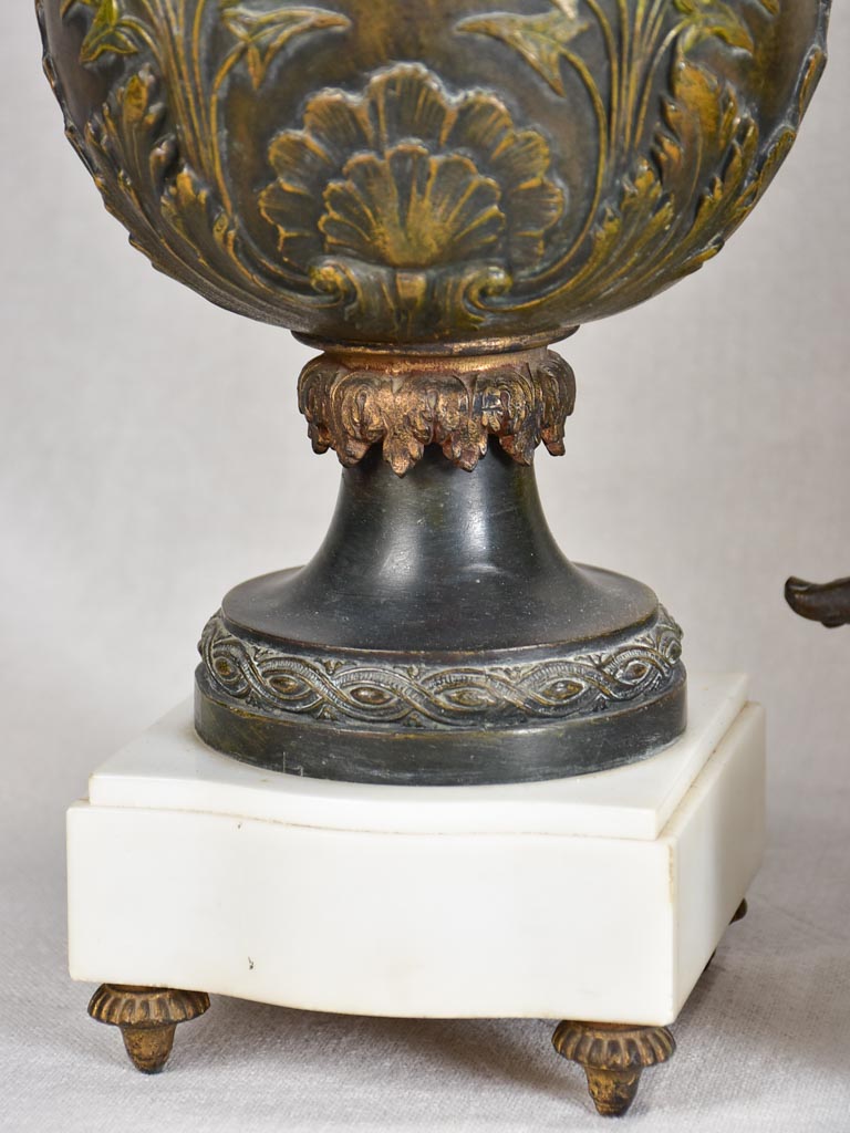 Napoleon III mantle clock with matching ornamental urns