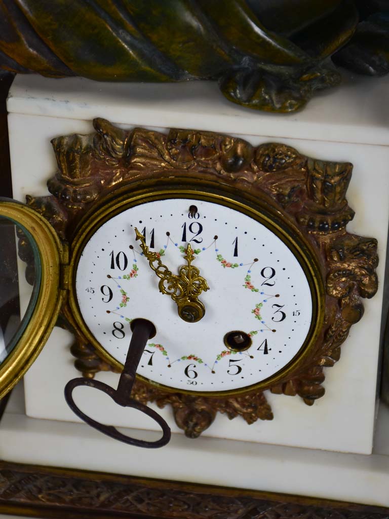 Napoleon III mantle clock with matching ornamental urns