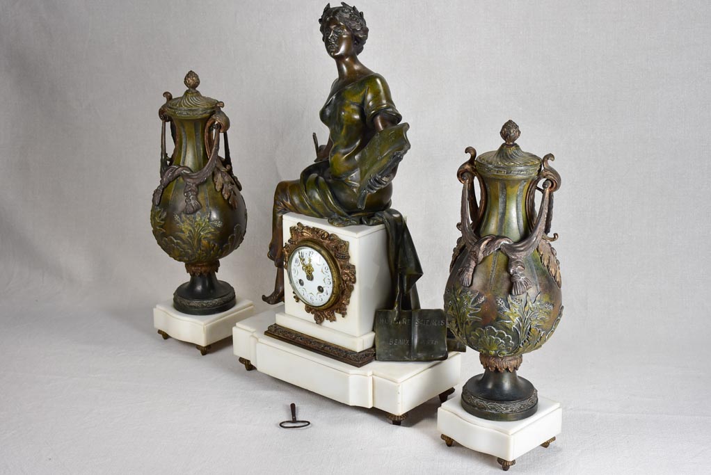 Napoleon III mantle clock with matching ornamental urns
