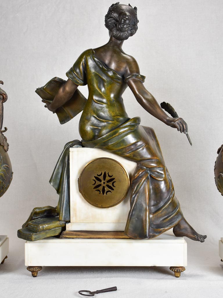 Napoleon III mantle clock with matching ornamental urns