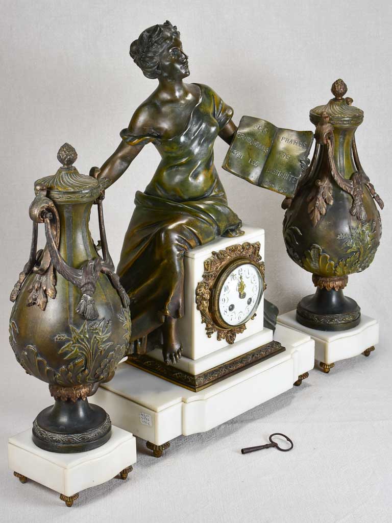 Napoleon III mantle clock with matching ornamental urns