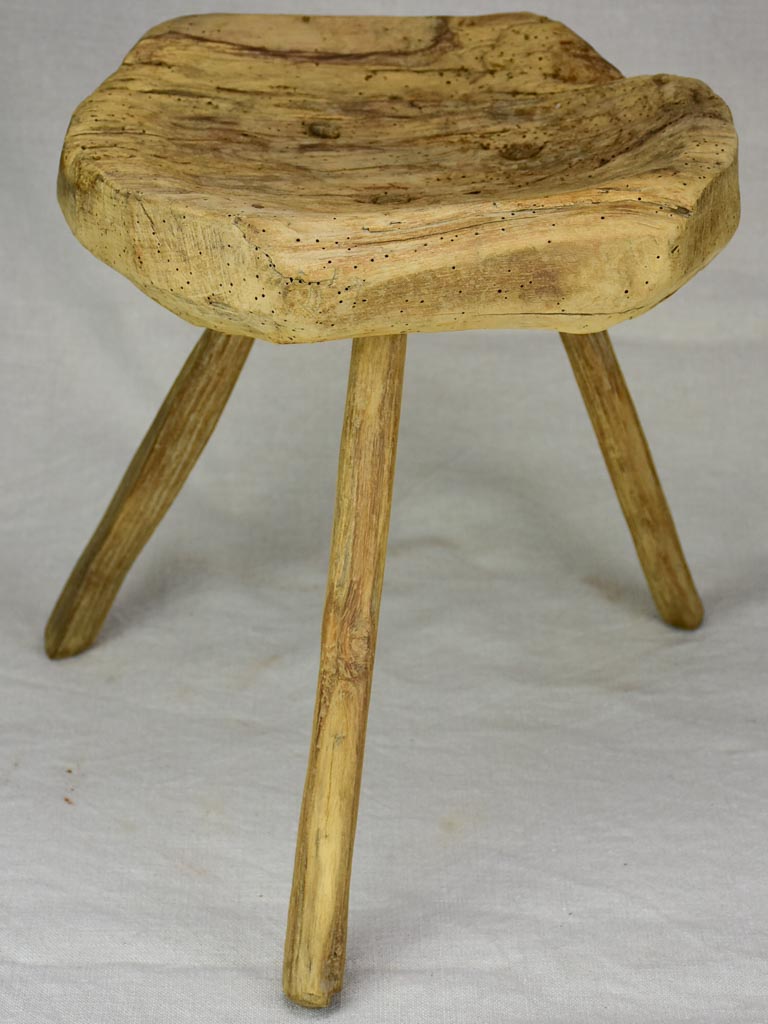 Timeworn antique French primitive milking stool