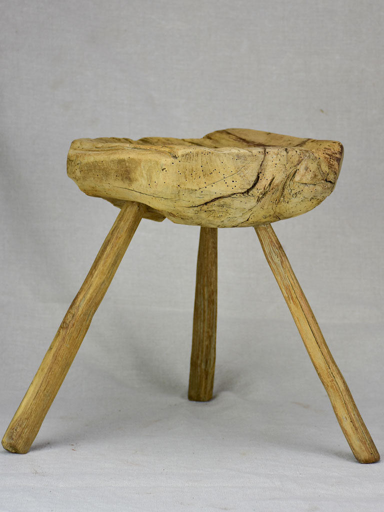 Timeworn antique French primitive milking stool