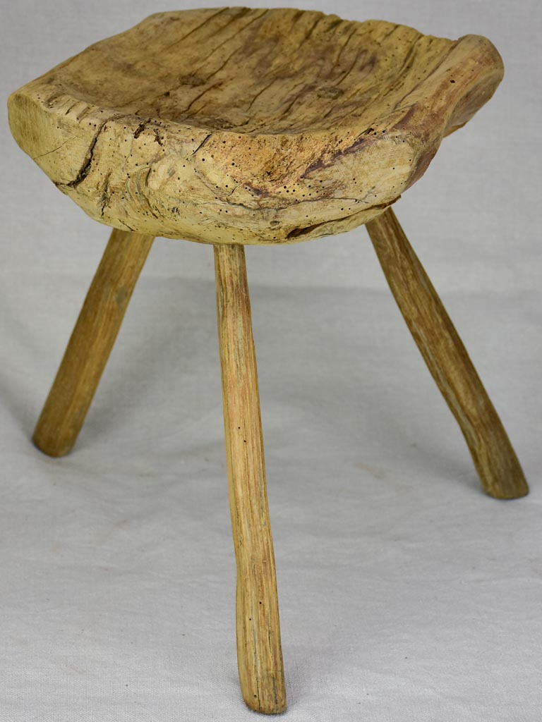 Timeworn antique French primitive milking stool