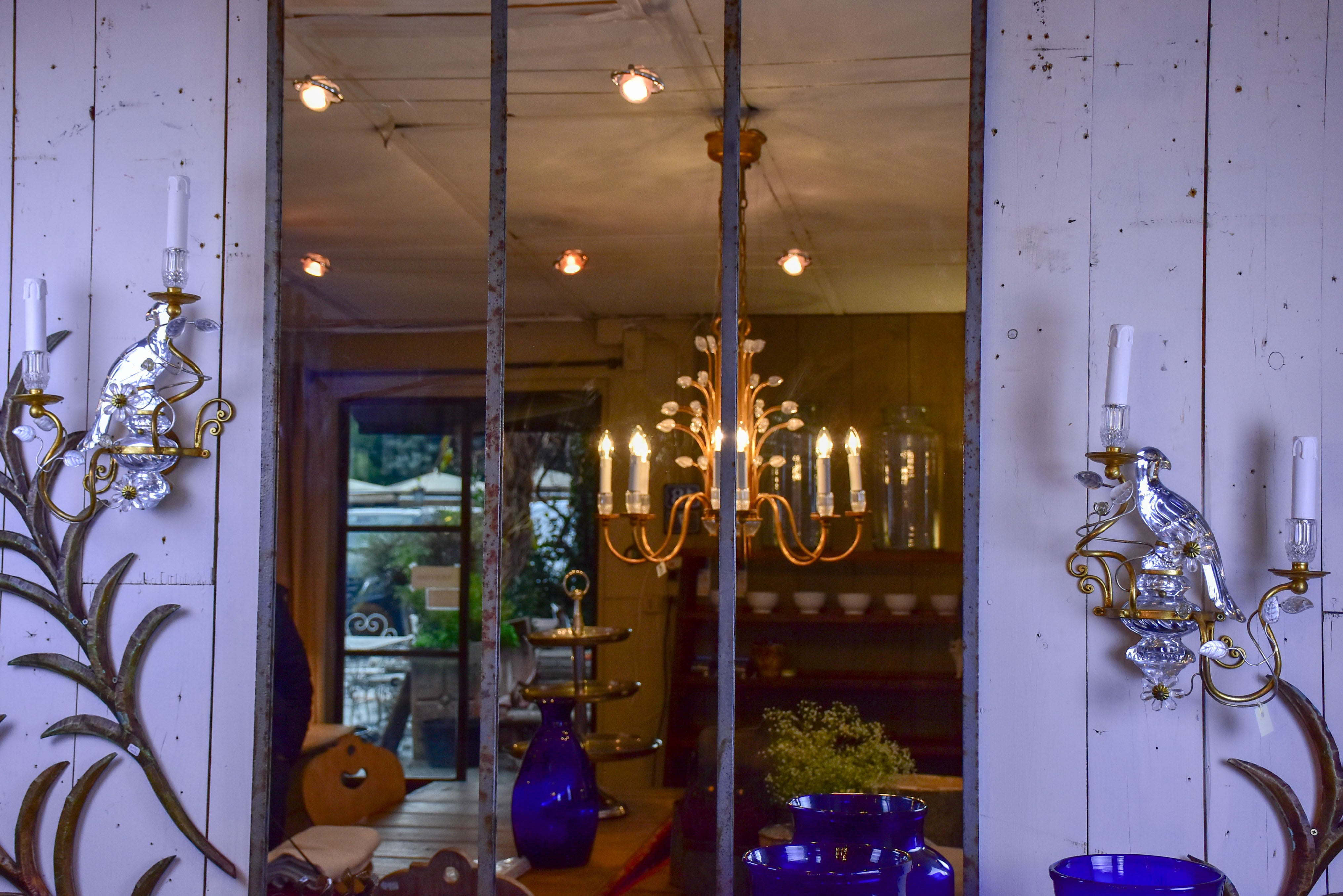 Pair of Parrot wall sconces in the style of Maison Baguès