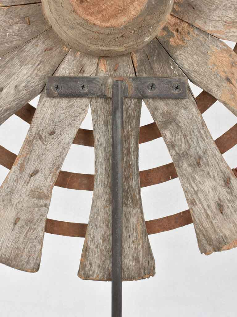Iron-based wooden sunburst sculptures