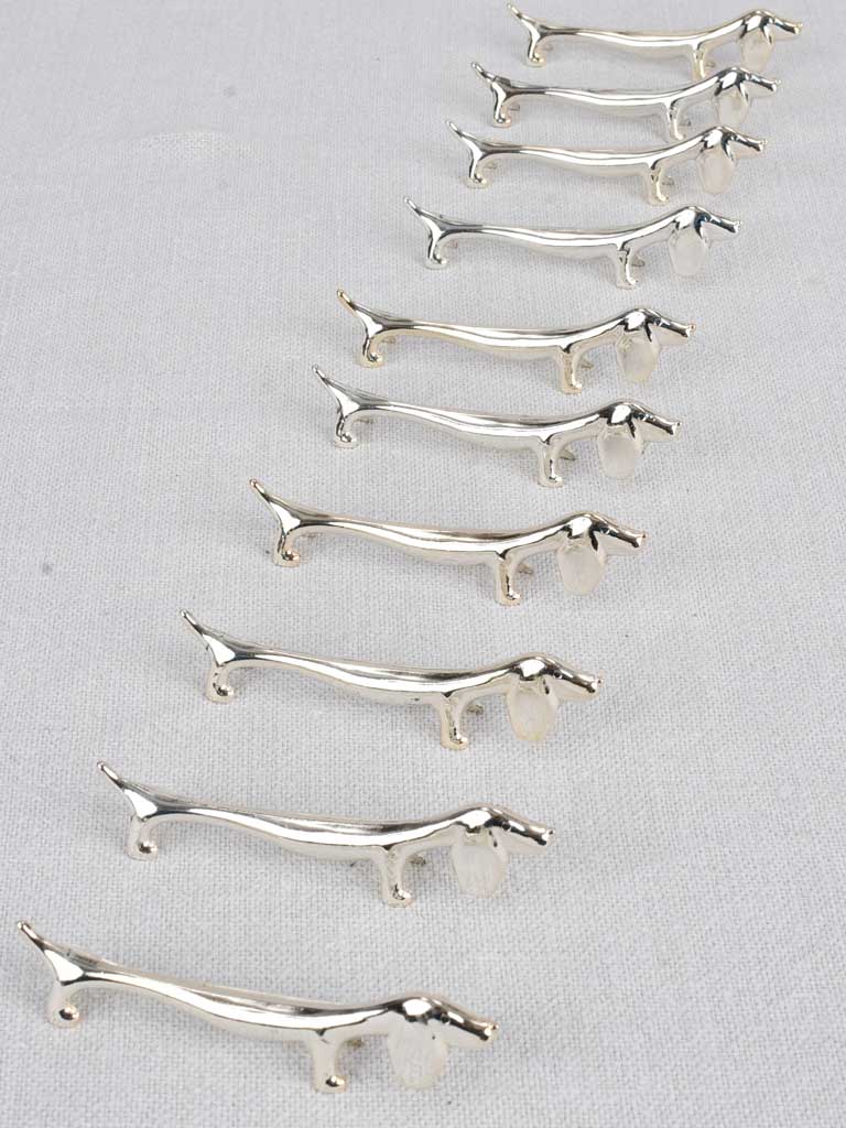 Set of 10 vintage dachshund shaped knife rests 3½"