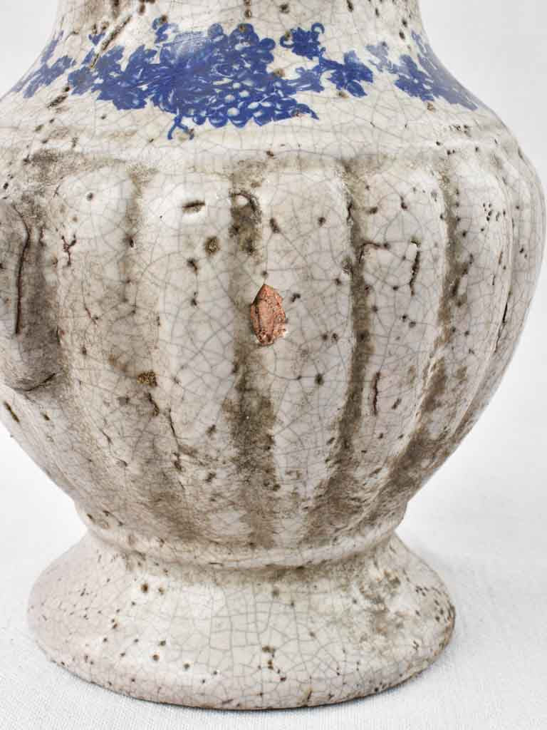 Classic terracotta French wine pitcher