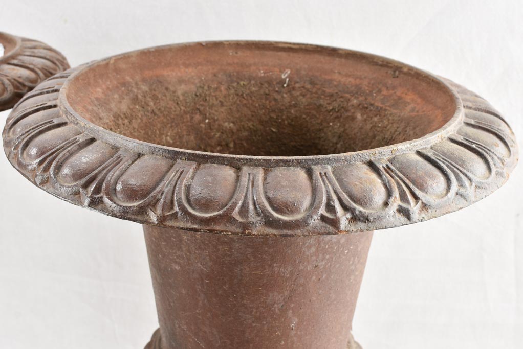 Pair of large antique cast iron Medici planters 25¼"