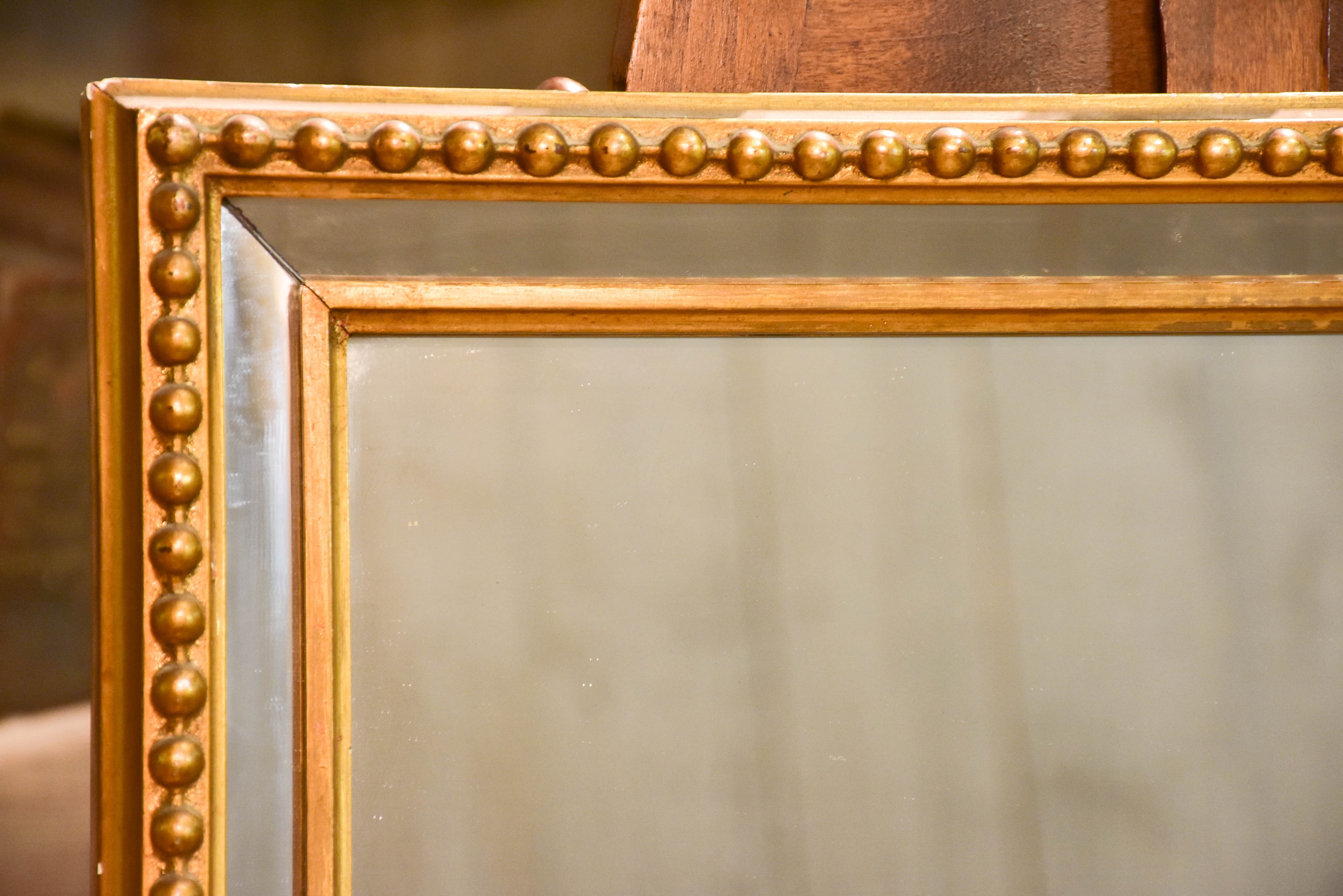 Late 19th century rectangular French mirror with large pearl border
