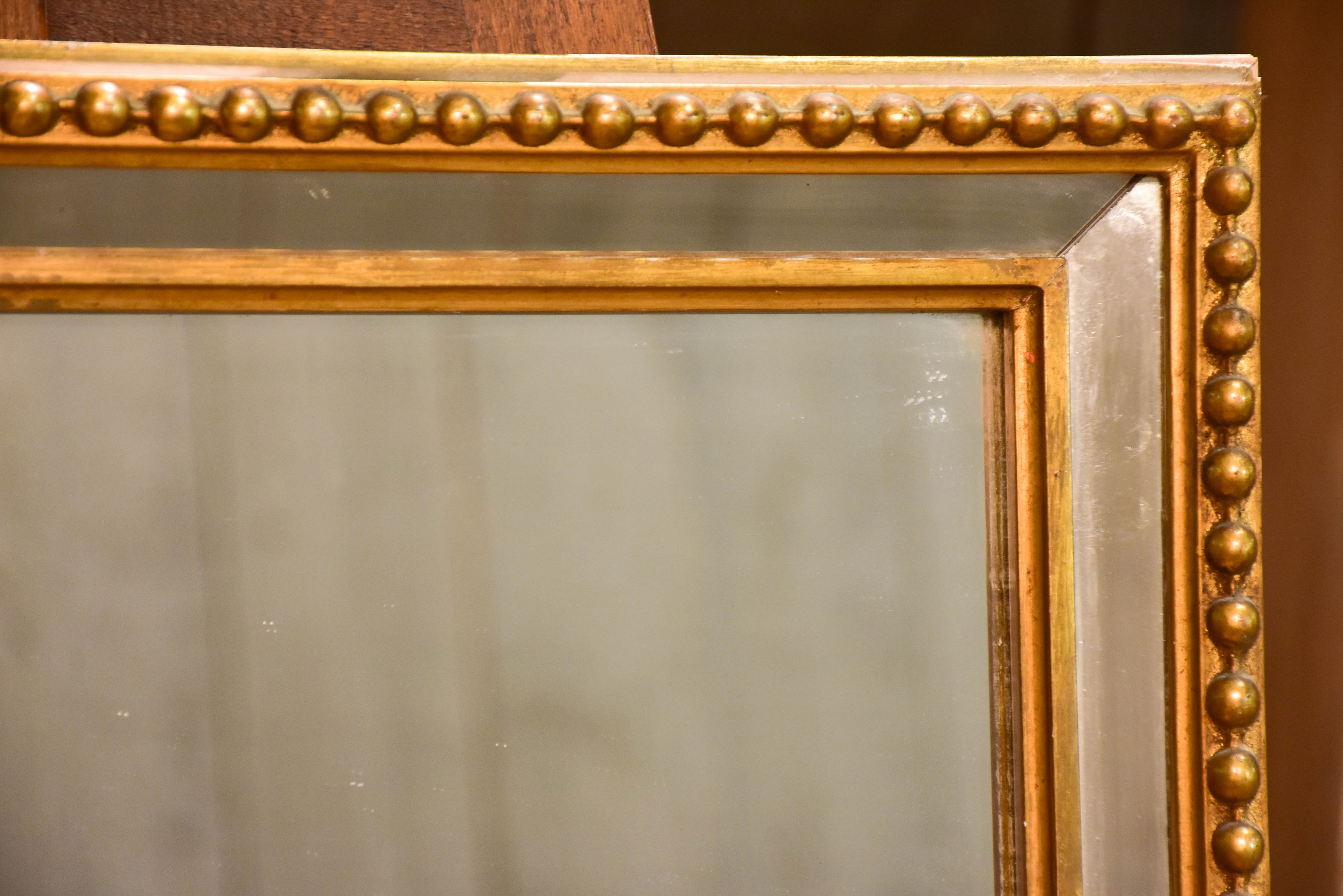 Late 19th century rectangular French mirror with large pearl border