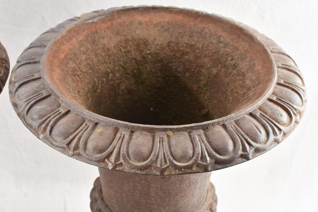 Pair of large antique cast iron Medici planters 25¼"