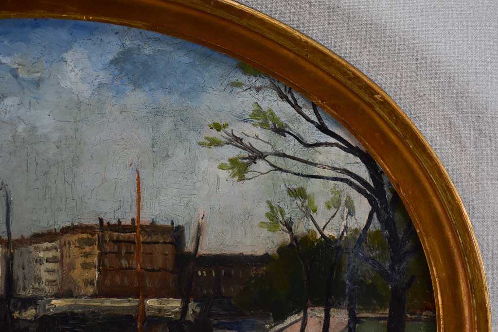 Oval medallion Parisian riverbank scene by Charles Réal (1898-1979) - oil on canvas 22½" x 27¼"