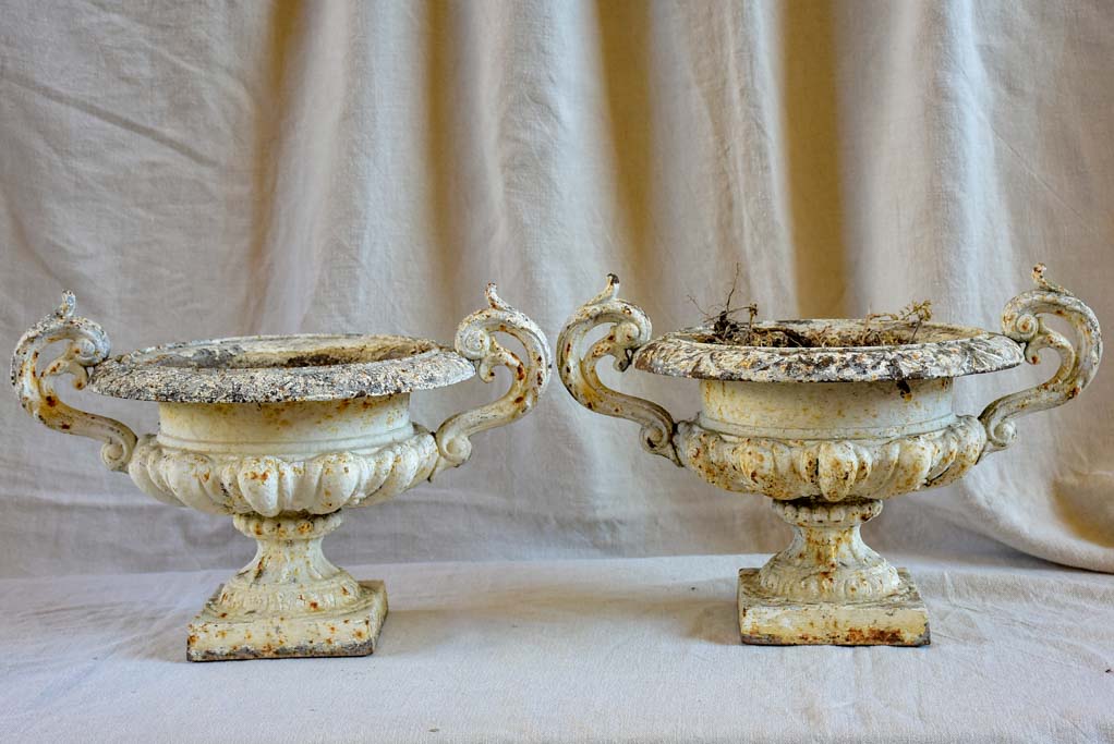 Pair of antique French Medici urns with handles