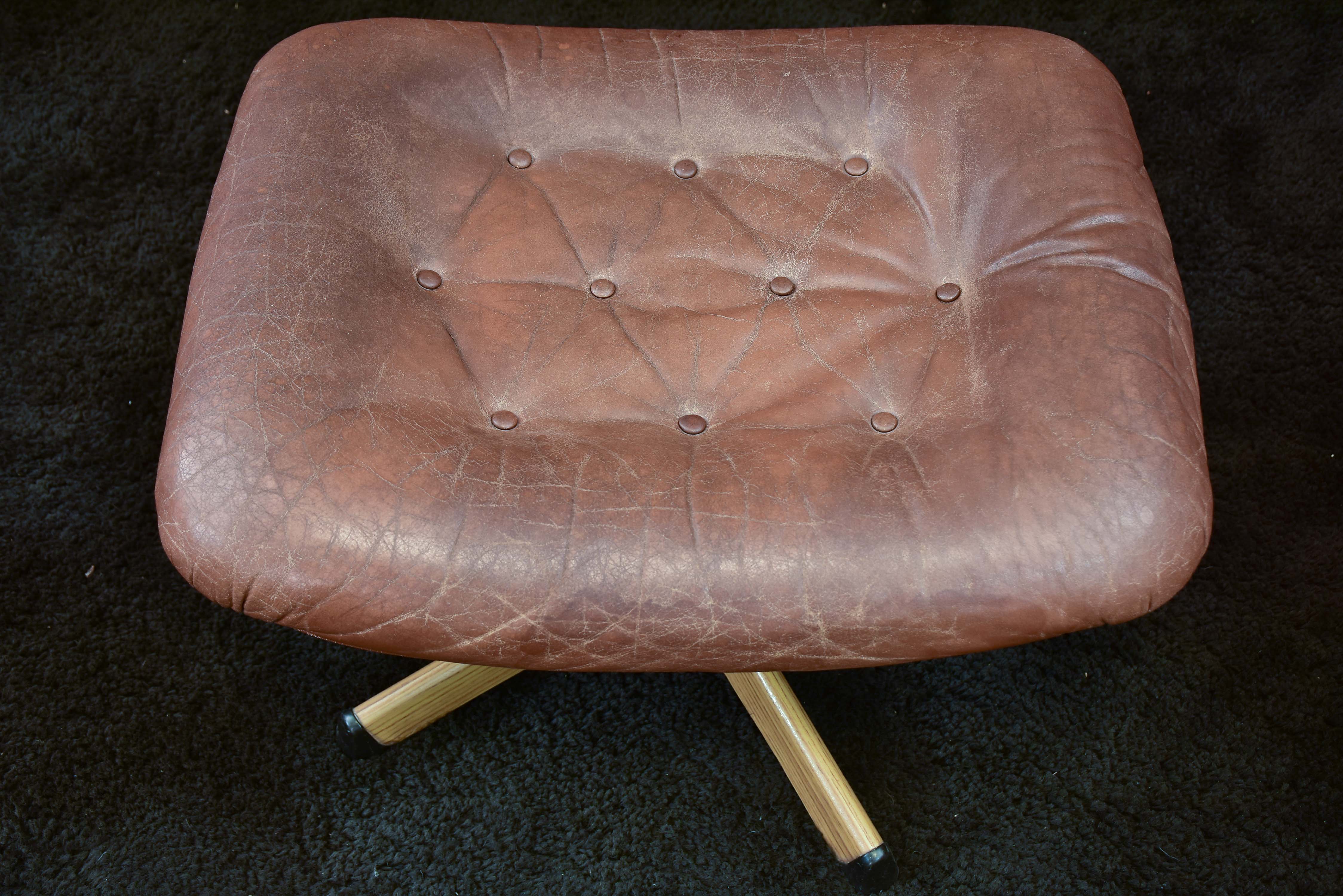 Pair of G mobel armchairs and foot rest