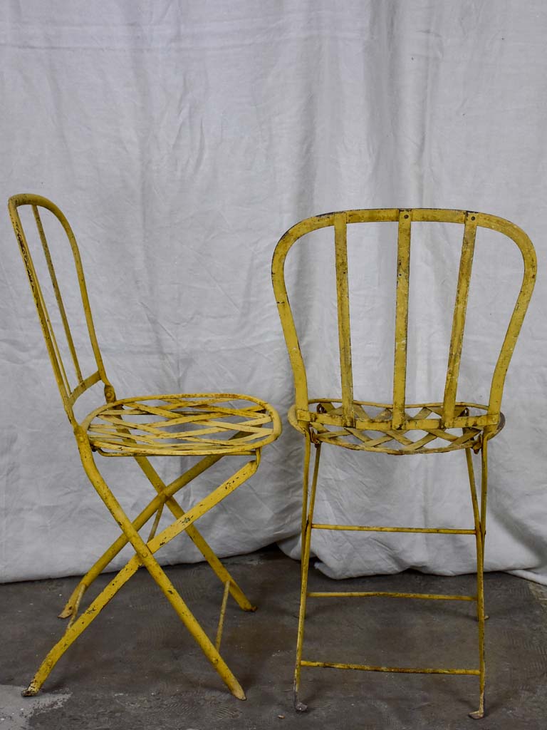 Pair of antique French folding garden chairs - wrought iron