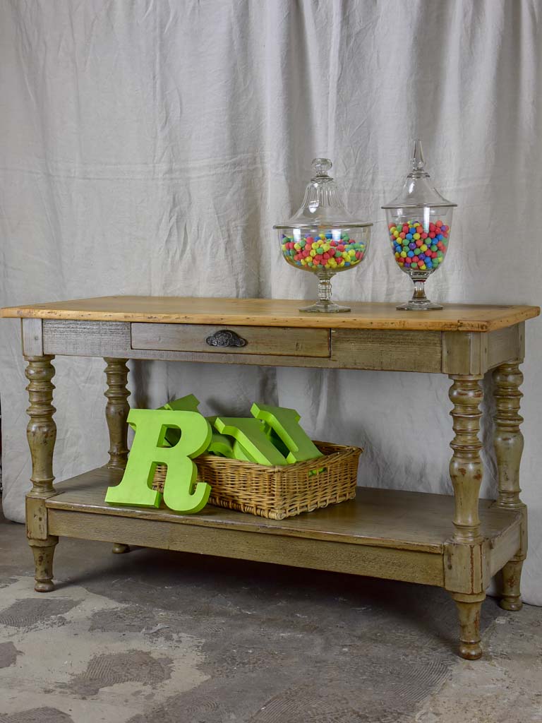 Antique French drapery table / behind couch table