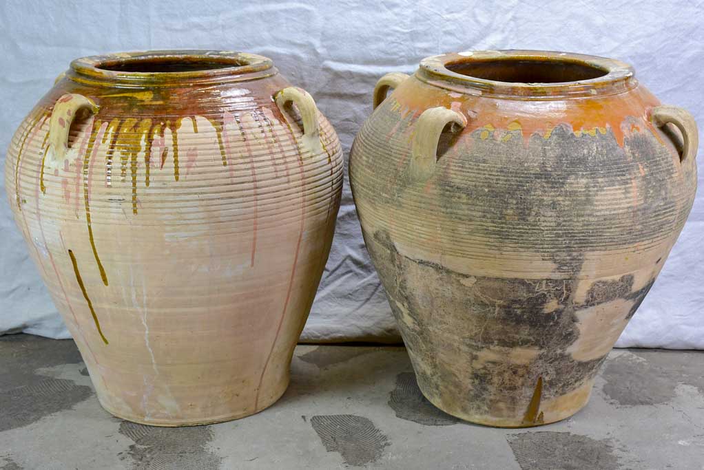 Two very large Spanish terracotta olive pots with four handles 28"