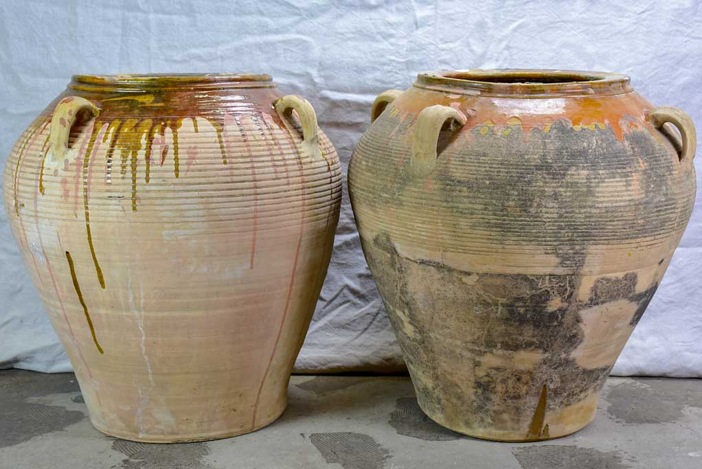 Two very large Spanish terracotta olive pots with four handles 28"