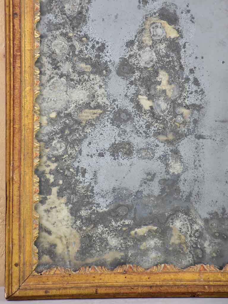 Nineteenth century French mirror with gilded frame and heavily aged glass 22½" x 28¾"