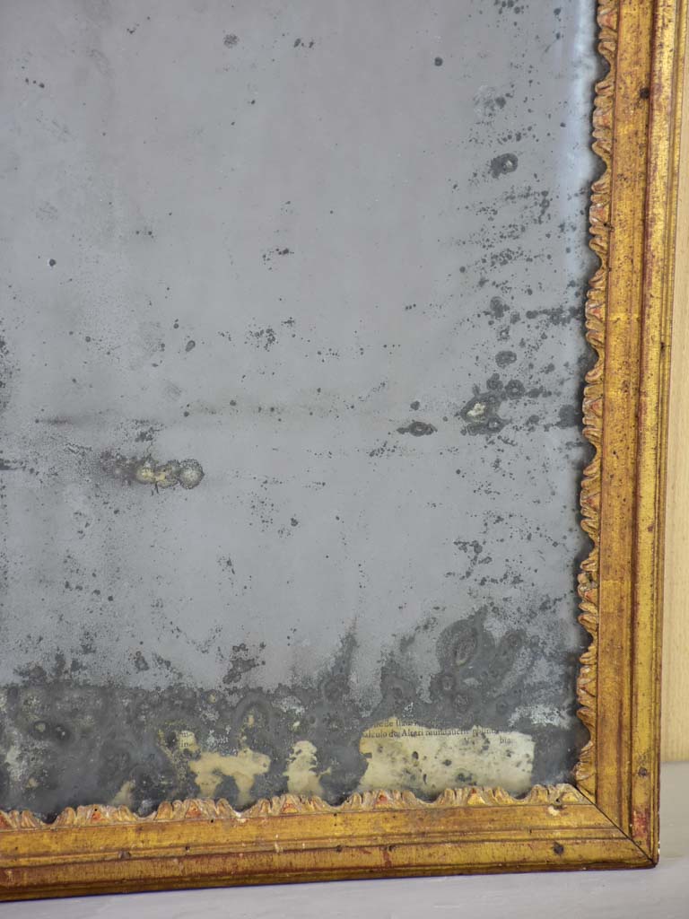 Nineteenth century French mirror with gilded frame and heavily aged glass 22½" x 28¾"