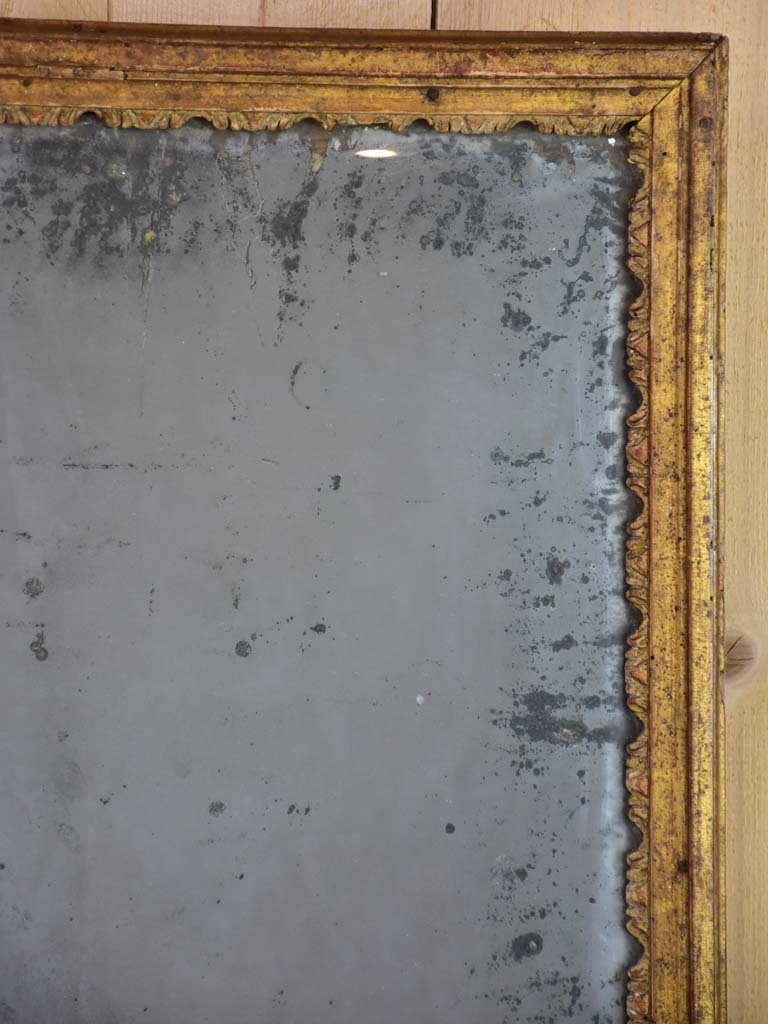 Nineteenth century French mirror with gilded frame and heavily aged glass 22½" x 28¾"
