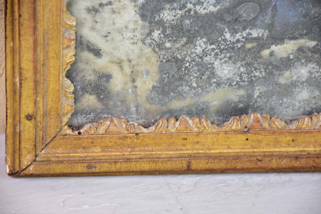 Nineteenth century French mirror with gilded frame and heavily aged glass 22½" x 28¾"
