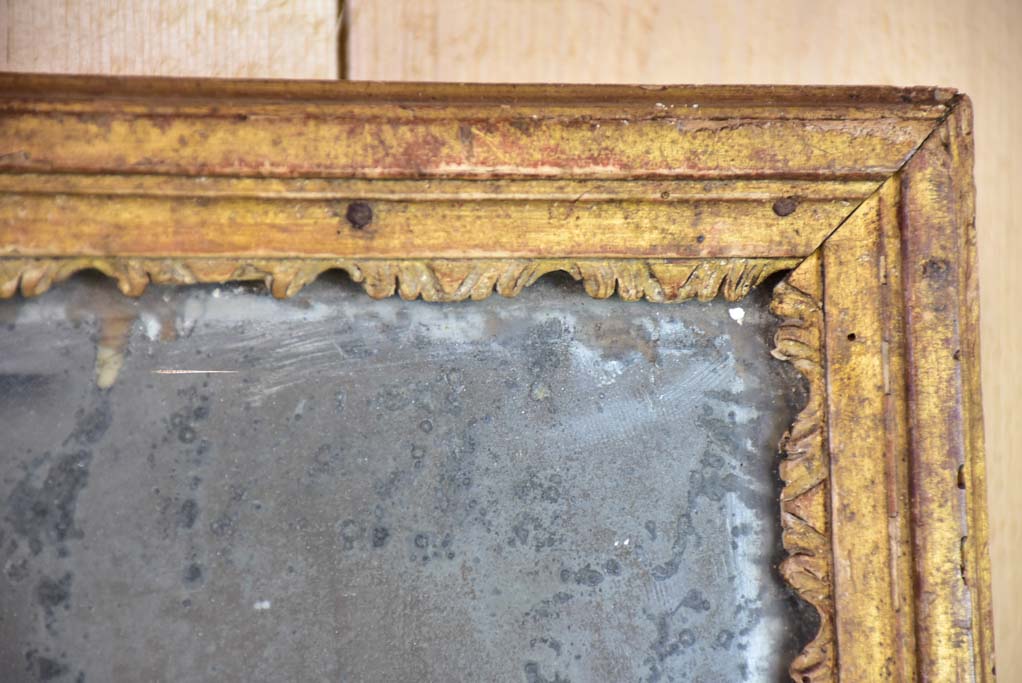 Nineteenth century French mirror with gilded frame and heavily aged glass 22½" x 28¾"