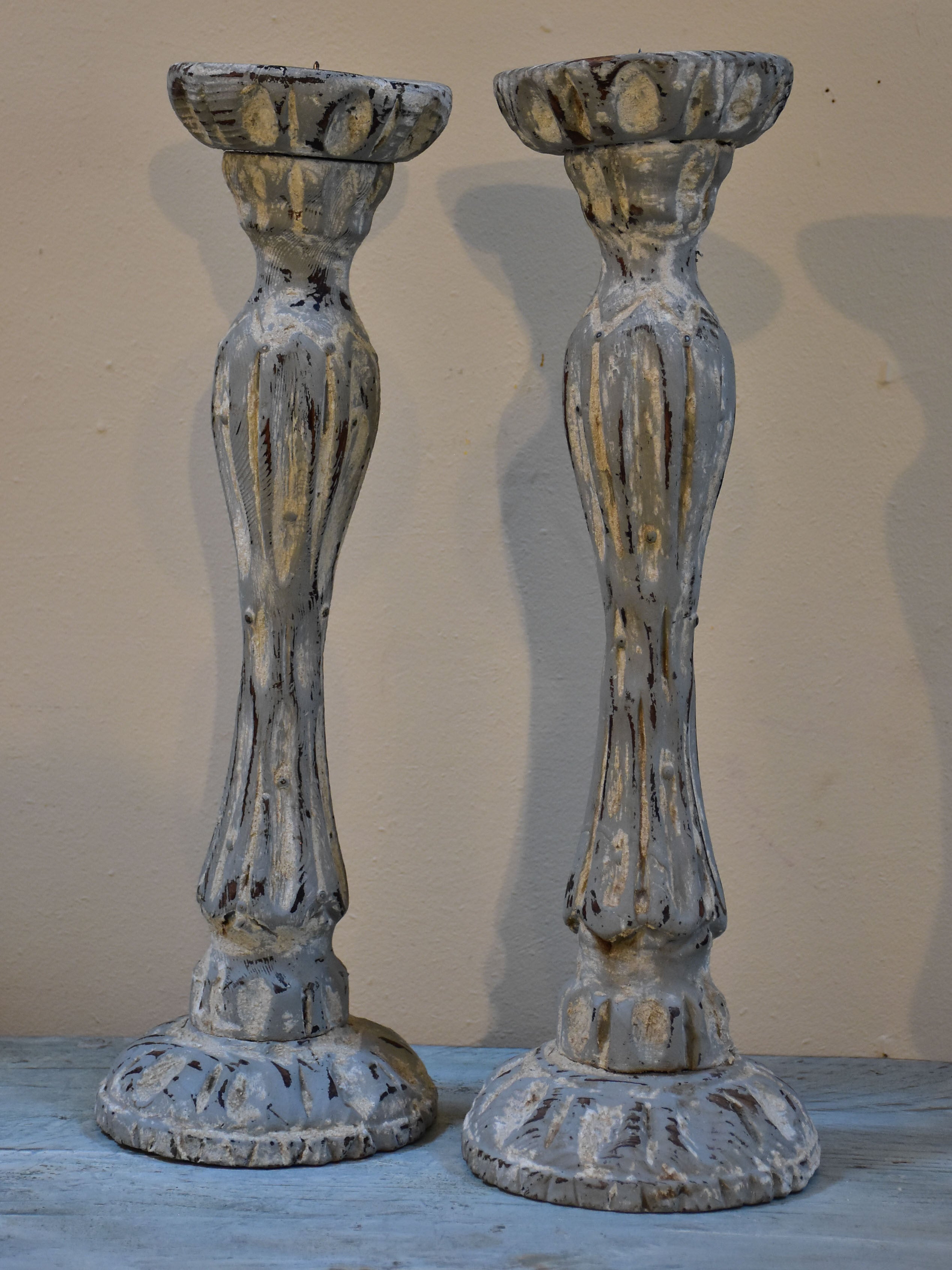 Pair of French candlesticks with white patina