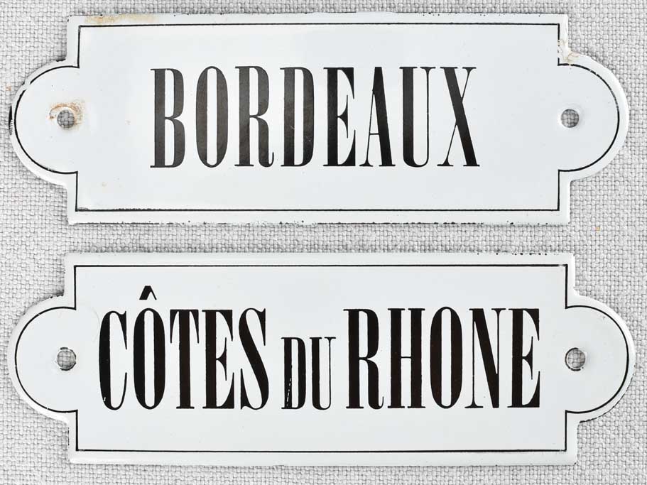 Collection of four enamel French wine appellation labels