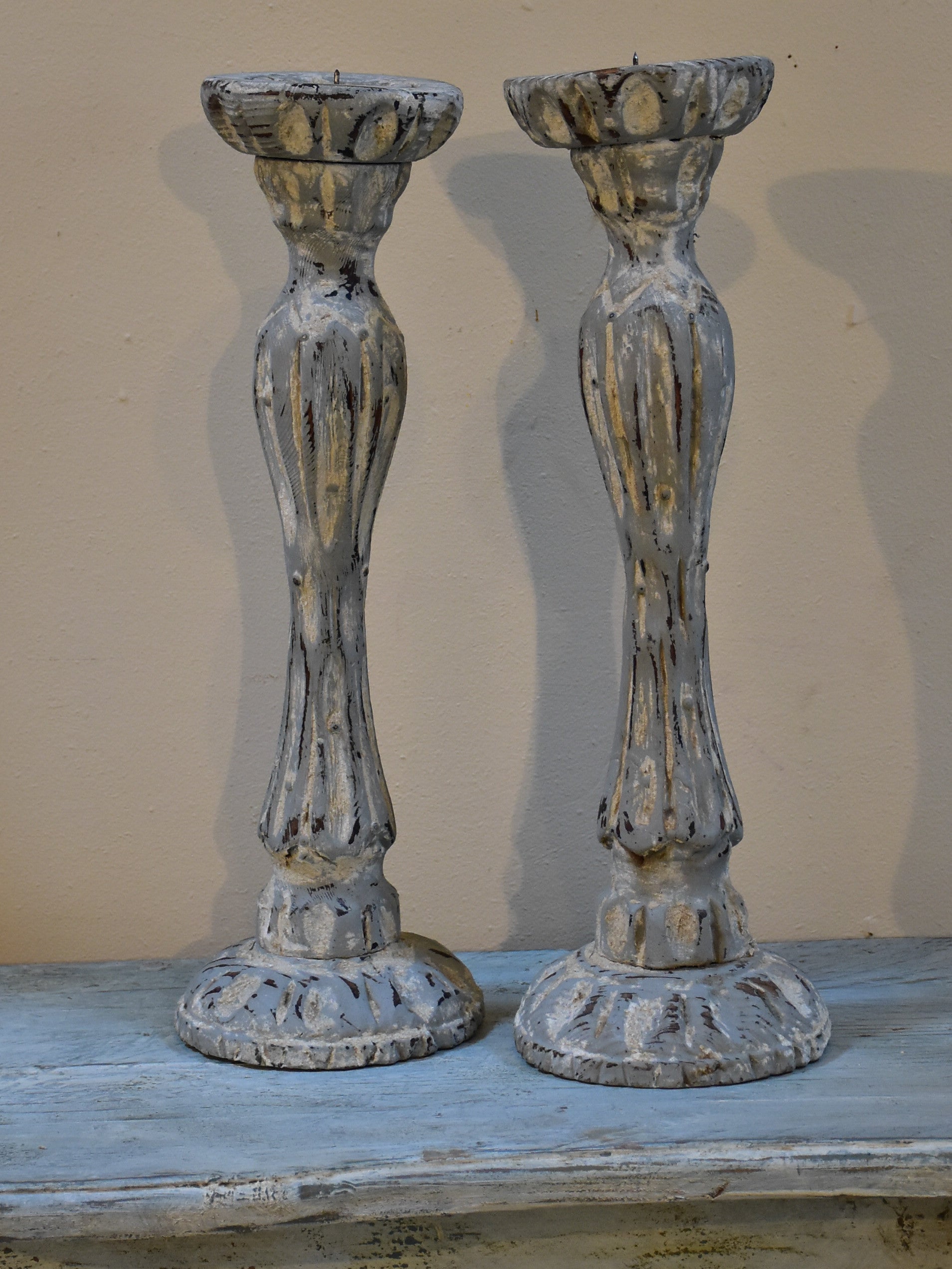 Pair of French candlesticks with white patina