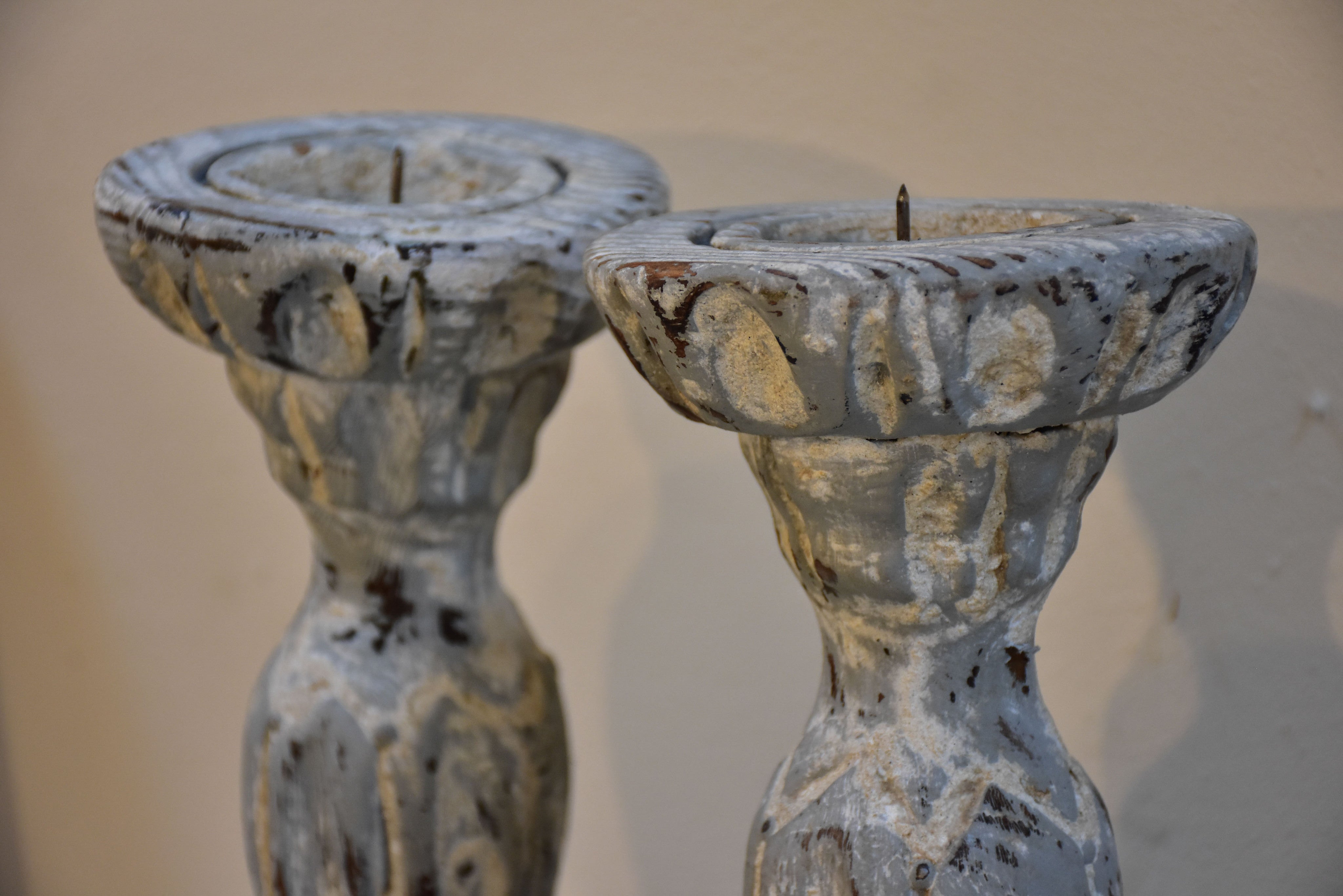 Pair of French candlesticks with white patina