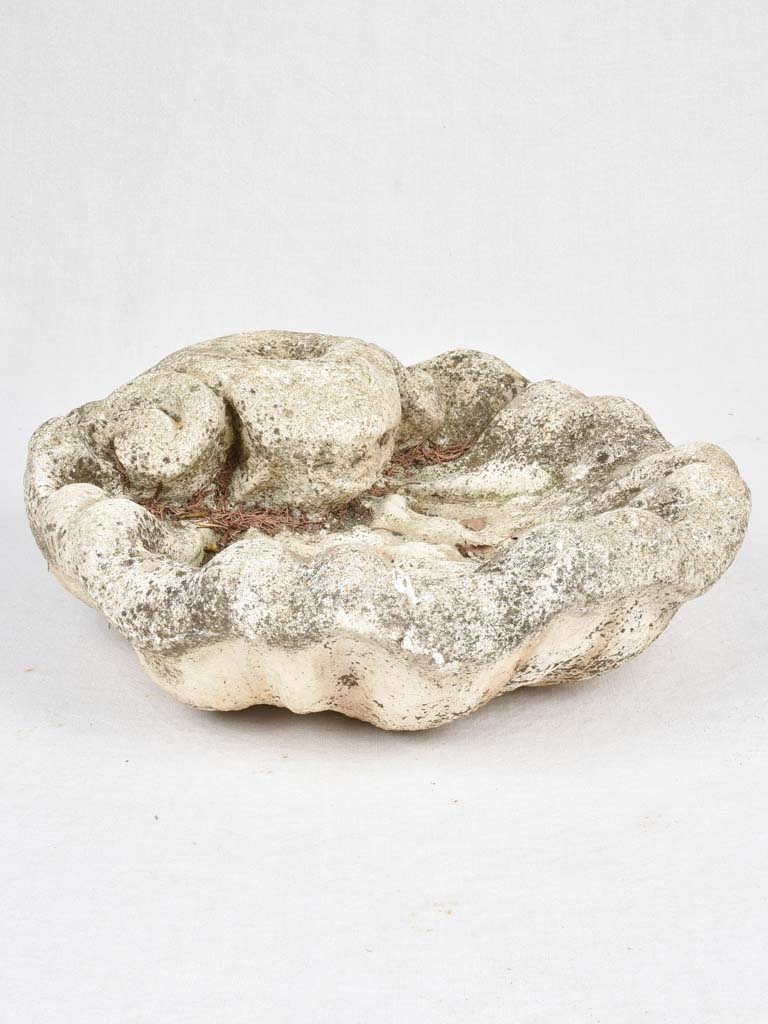 Vintage concrete shell-shaped fountain