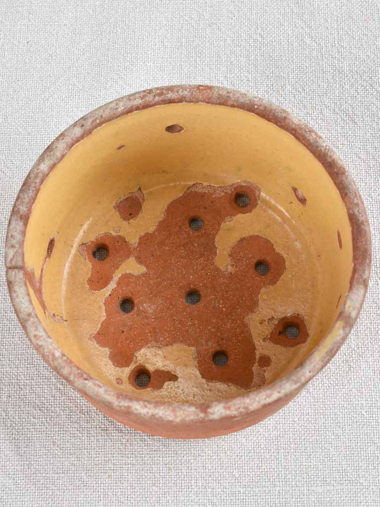 Collection of 21 terracotta cheese strainers 'faisselles'