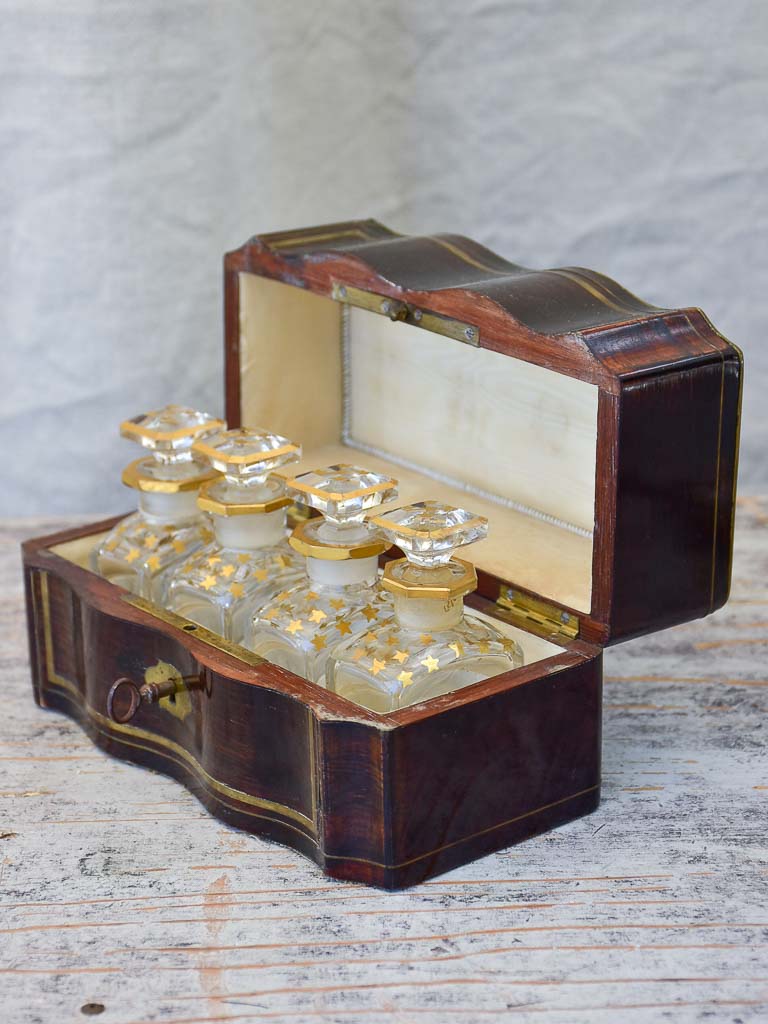 Four Antique Perfume Flasks in Wooden Box