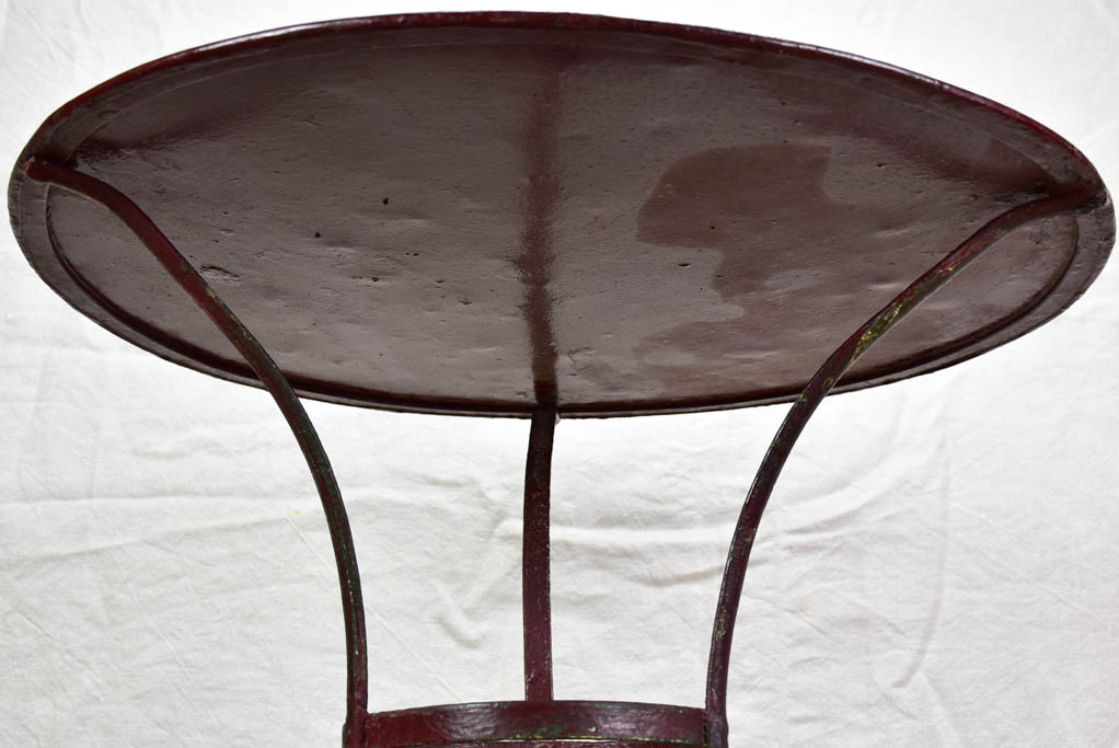 Antique French garden table with burgundy patina 27½"