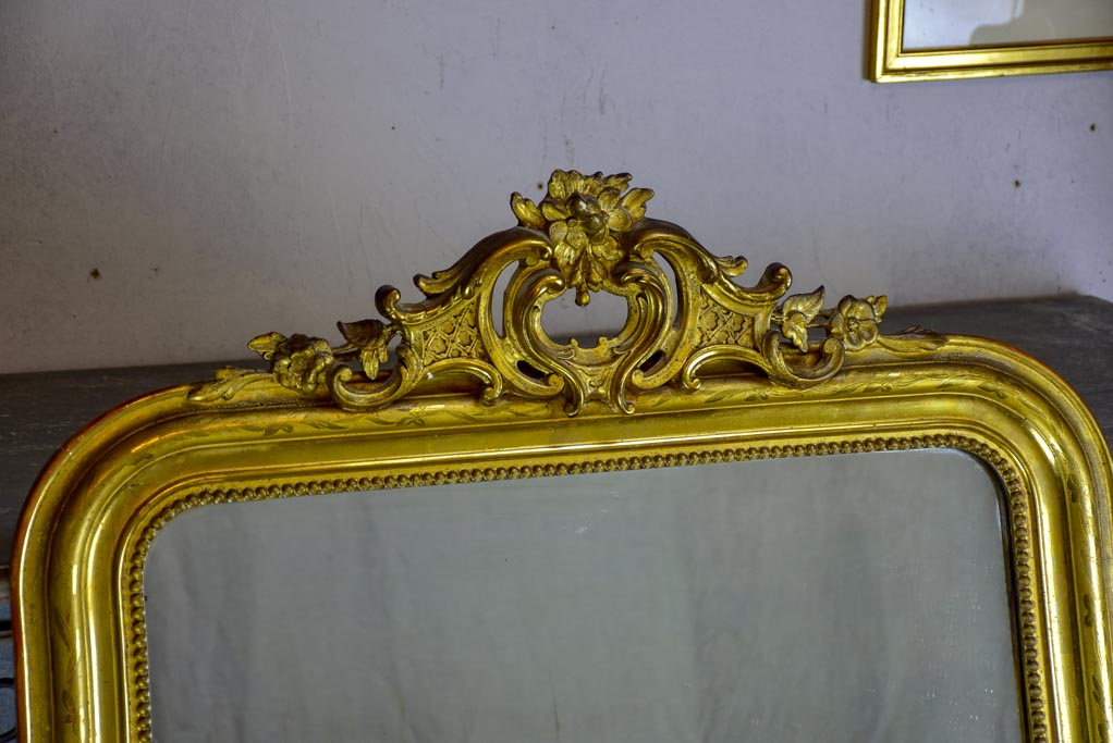Antique French Louis Philippe mirror with gilded frame and crest 30" x 49¼"