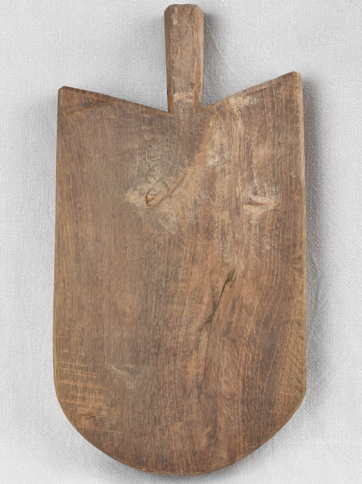 Antique French cutting board w/ rounded bottom & pointed shoulders 19¼" x 10¼"