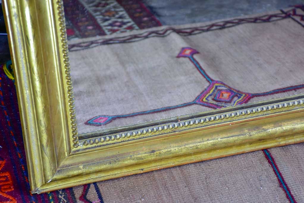 Antique French Louis Philippe mirror with gilded frame and crest 30" x 49¼"