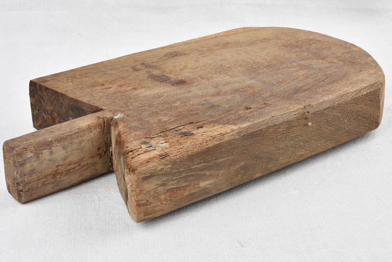 Antique French cutting board w/ rounded bottom & pointed shoulders 19¼" x 10¼"