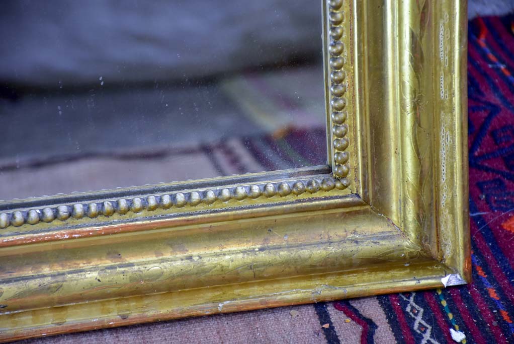 Antique French Louis Philippe mirror with gilded frame and crest 30" x 49¼"