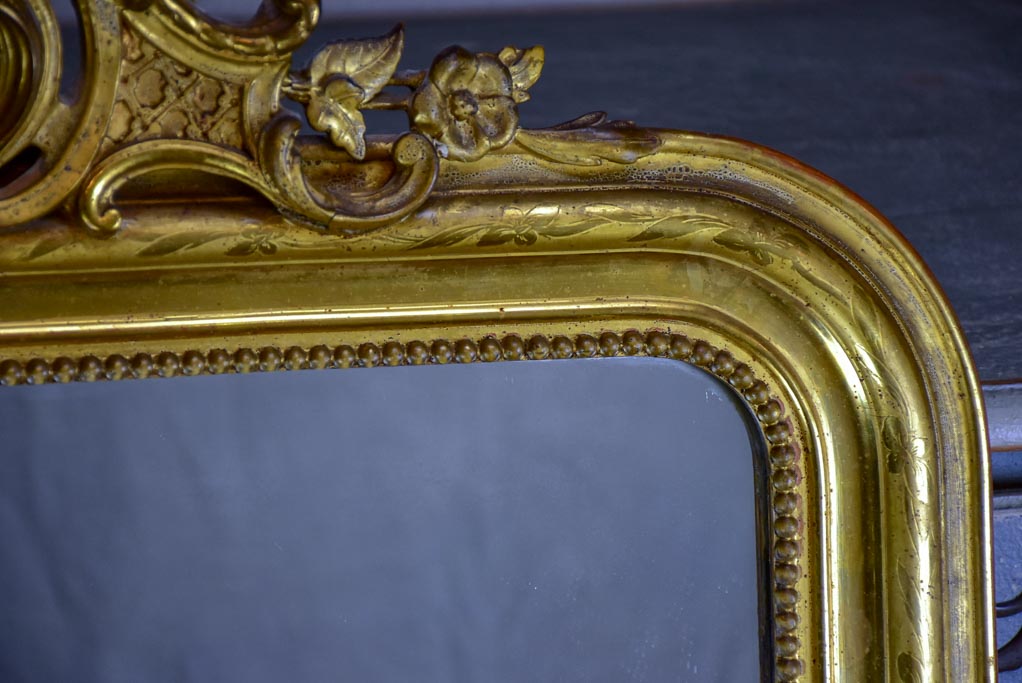 Antique French Louis Philippe mirror with gilded frame and crest 30" x 49¼"